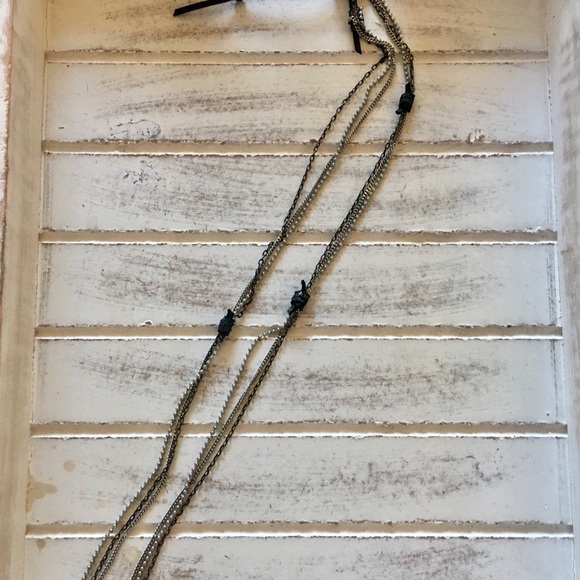 Long multi chain necklace with leather accent. - Picture 3 of 5